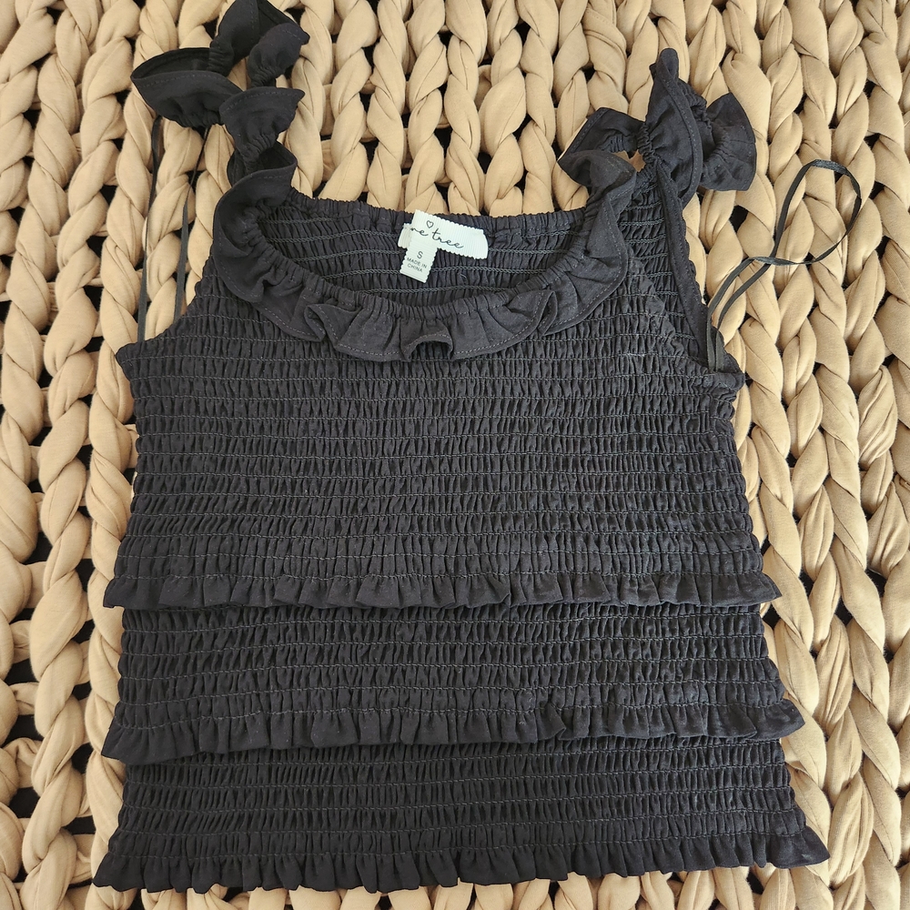 Black Ruffled Sleeveless Top